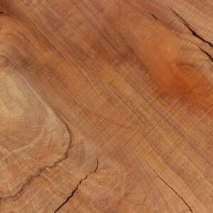 up close view of cracking in walnut piece