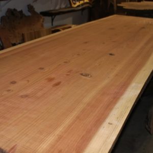 image of wood shop with large slabs of wood